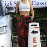 Kim Kardashian in a White Top Returns to Her Car in Malibu