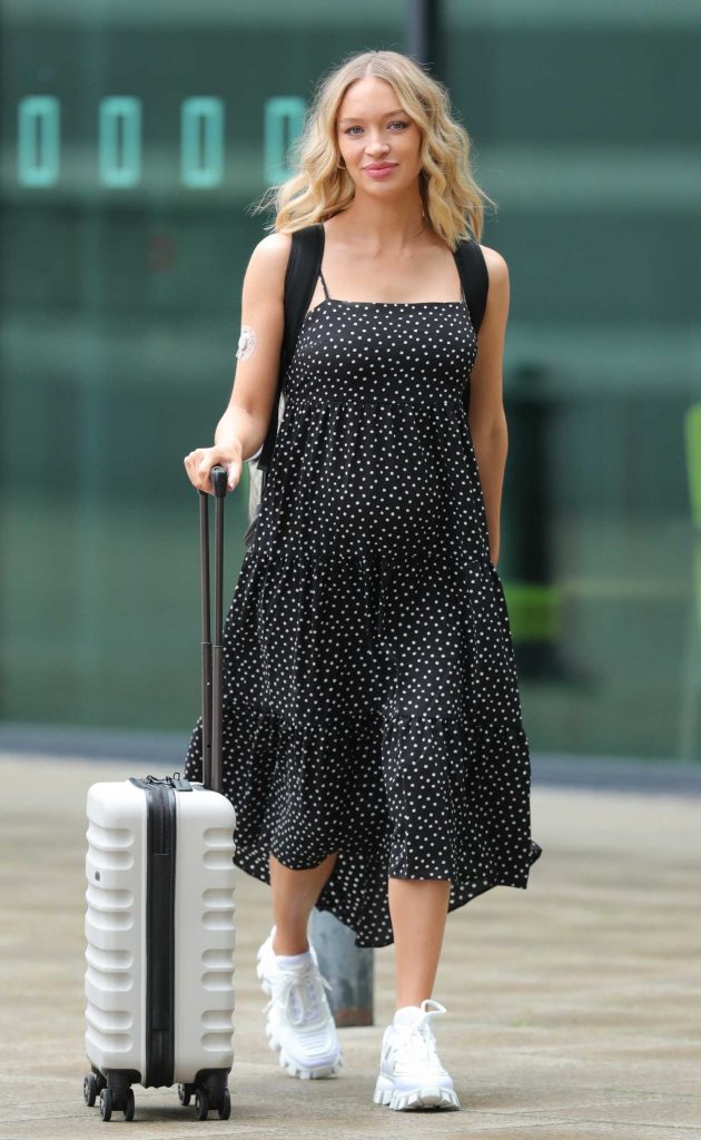 Roxy Horner in a Black Polka Dot Dress