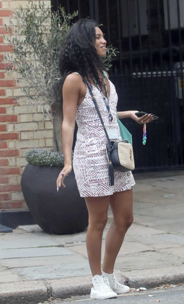 Vick Hope in a White Converse Gym Shoes
