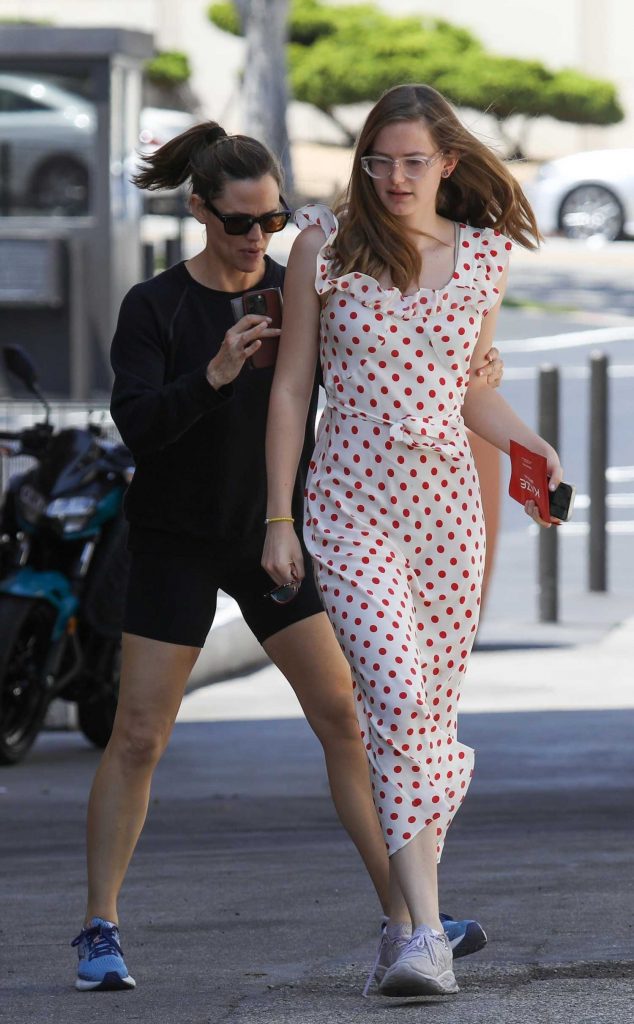 Violet Affleck in a White and Red Polka Dot Dress