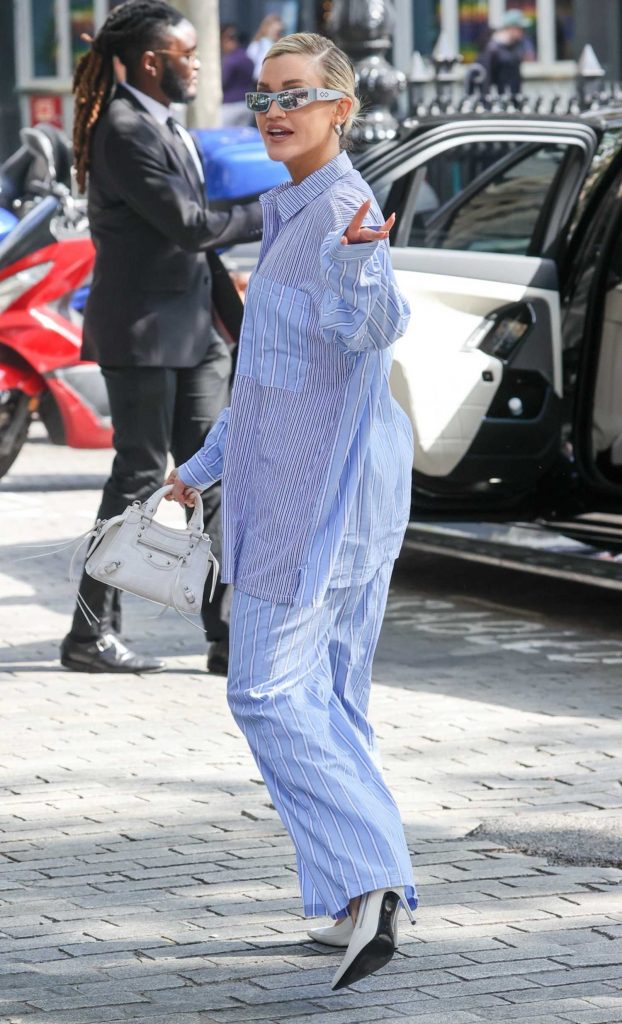 Ashley Roberts in a Striped Baby Blue Pantsuit