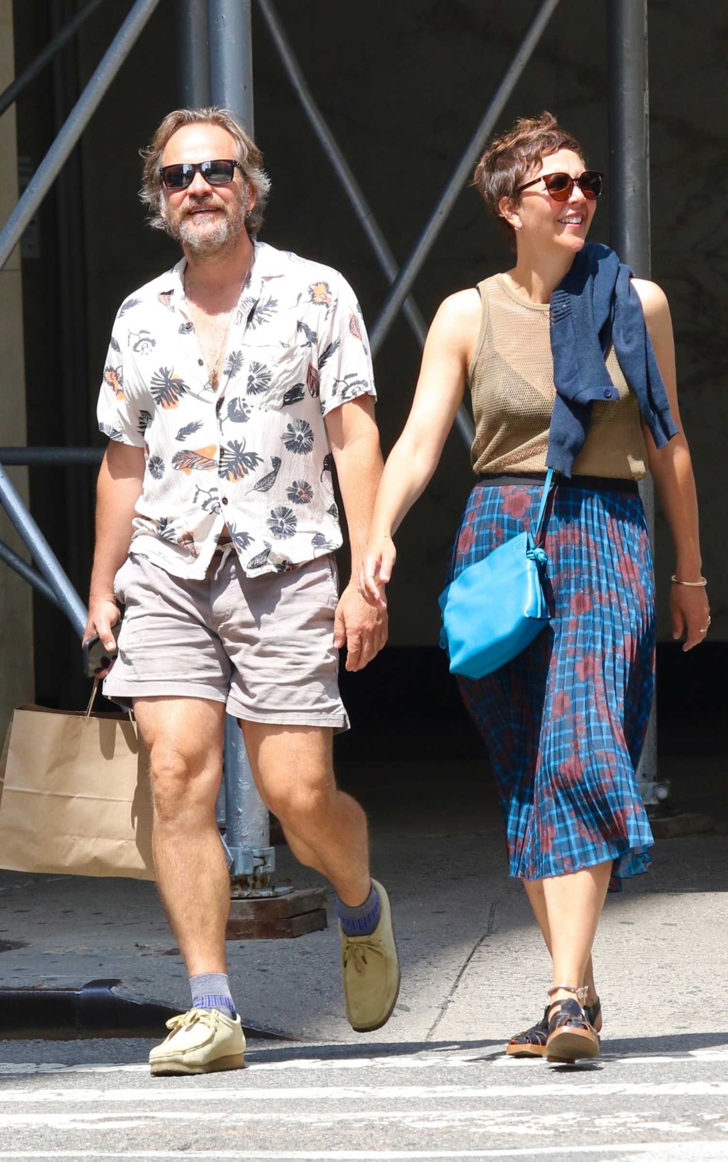 Maggie Gyllenhaal in a Beige Tank Top Was Seen During a Romantic Stroll