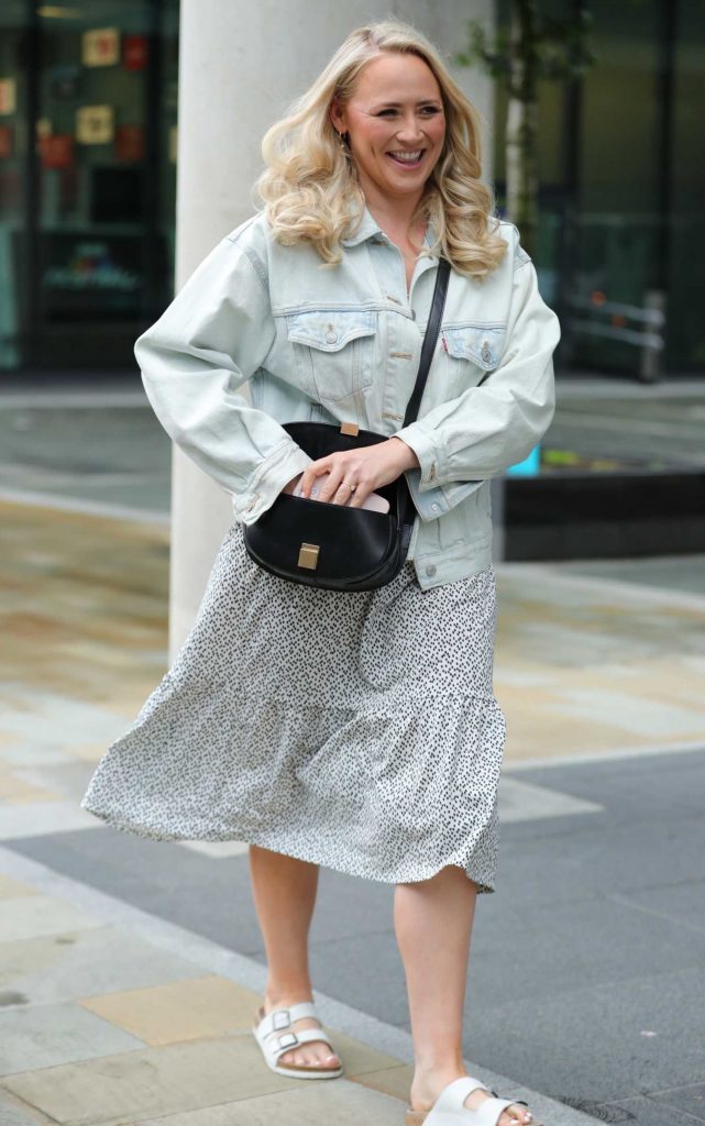 Amy Walsh in a Blue Denim Jacket