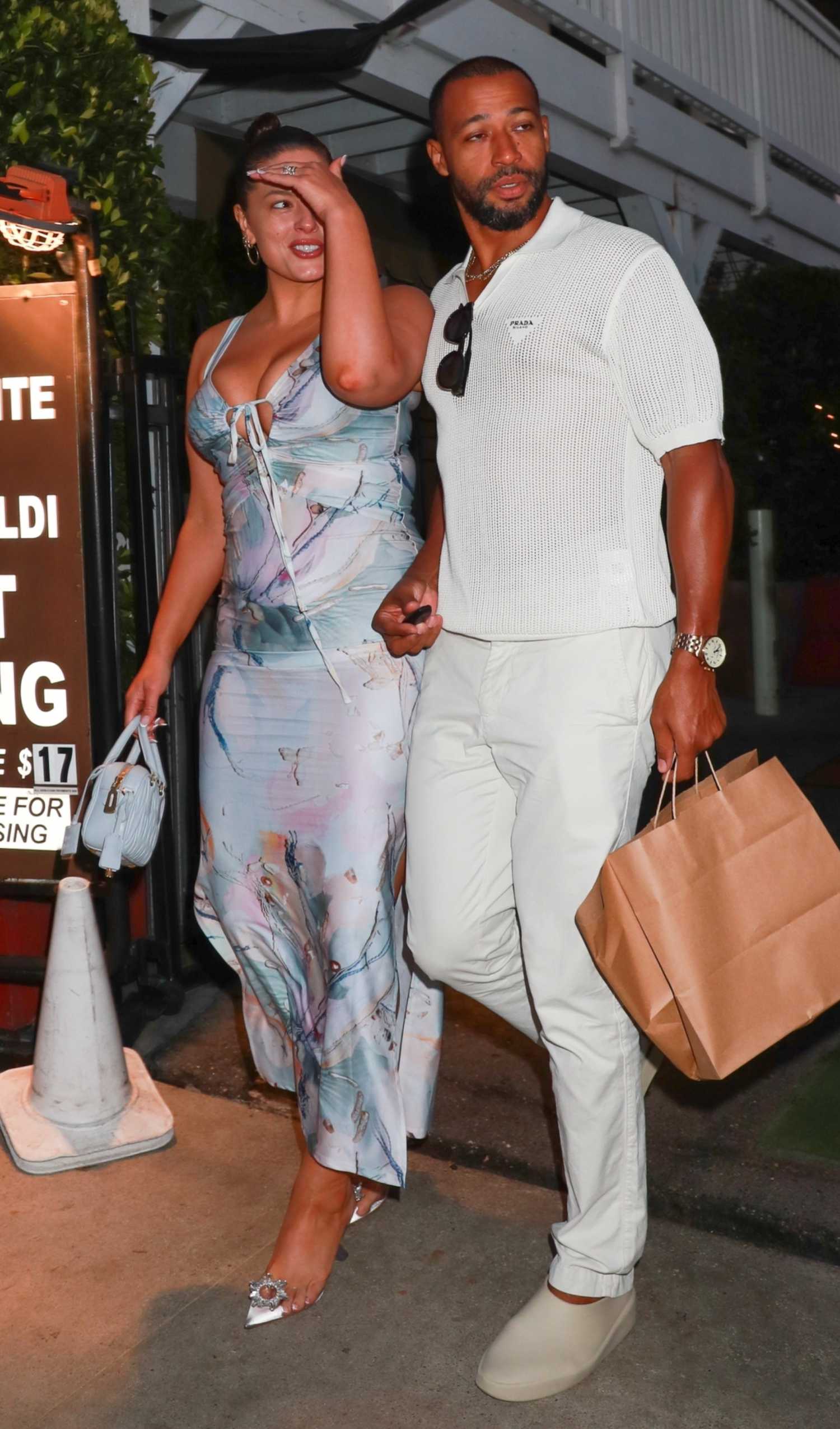 Ashley Graham Leaves After Dinner at Giorgio Baldi with Justin Ervin in