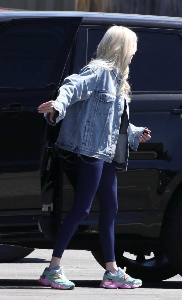 Erika Jayne in a Blue Denim Jacket
