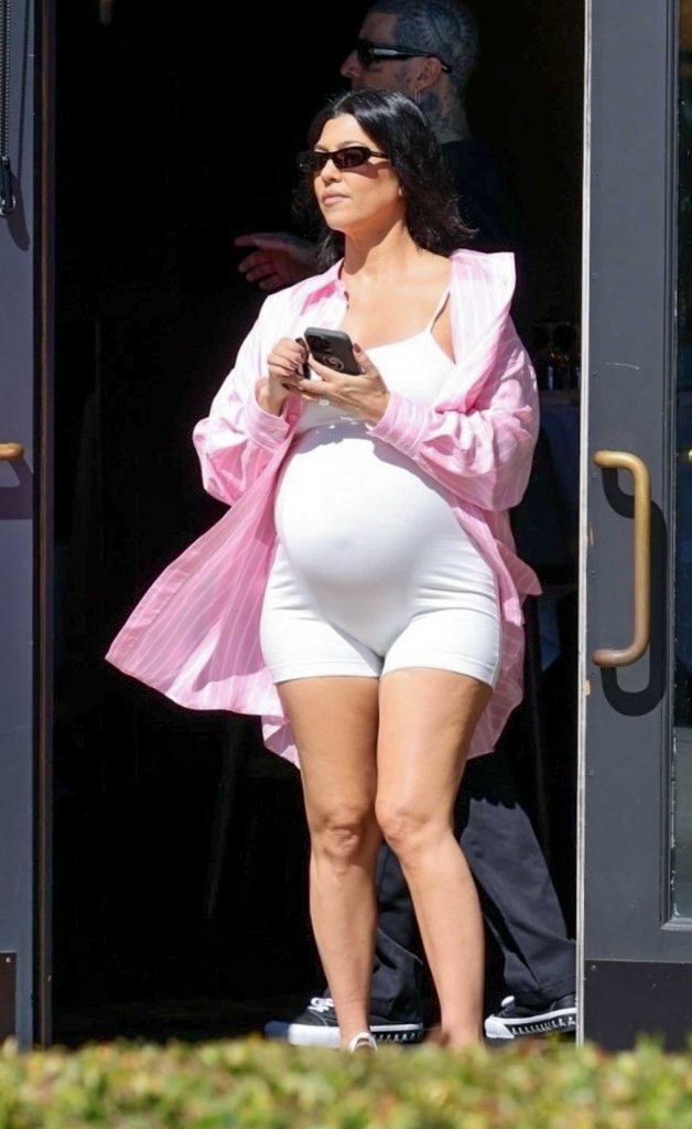 Kourtney Kardashian in a Pink Shirt