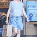 Milla Jovovich in a Grey Tee Goes Essential Item Shopping at Ralph’s in Malibu