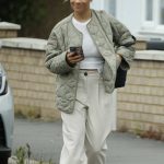 Molly Rainford in a Beige Pants Heads to the Train Station in London