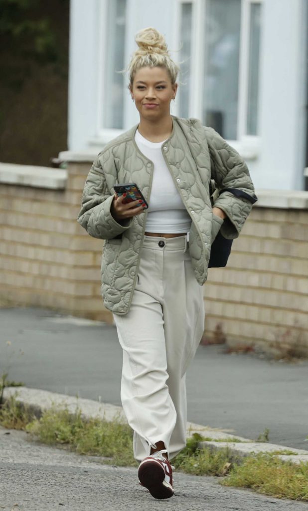 Molly Rainford in a Beige Pants