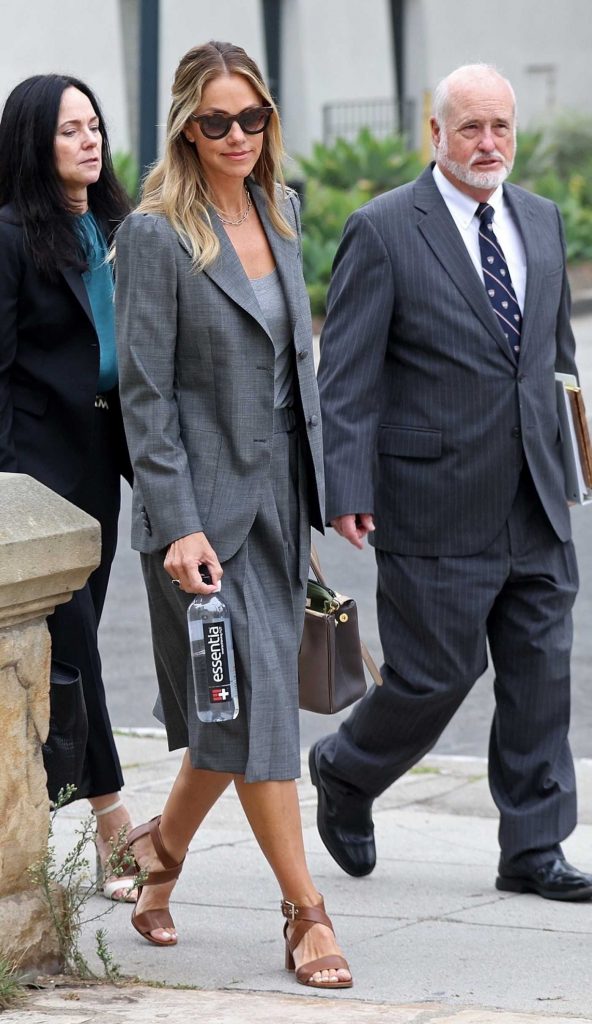 Christine Baumgartner in a Grey Suit