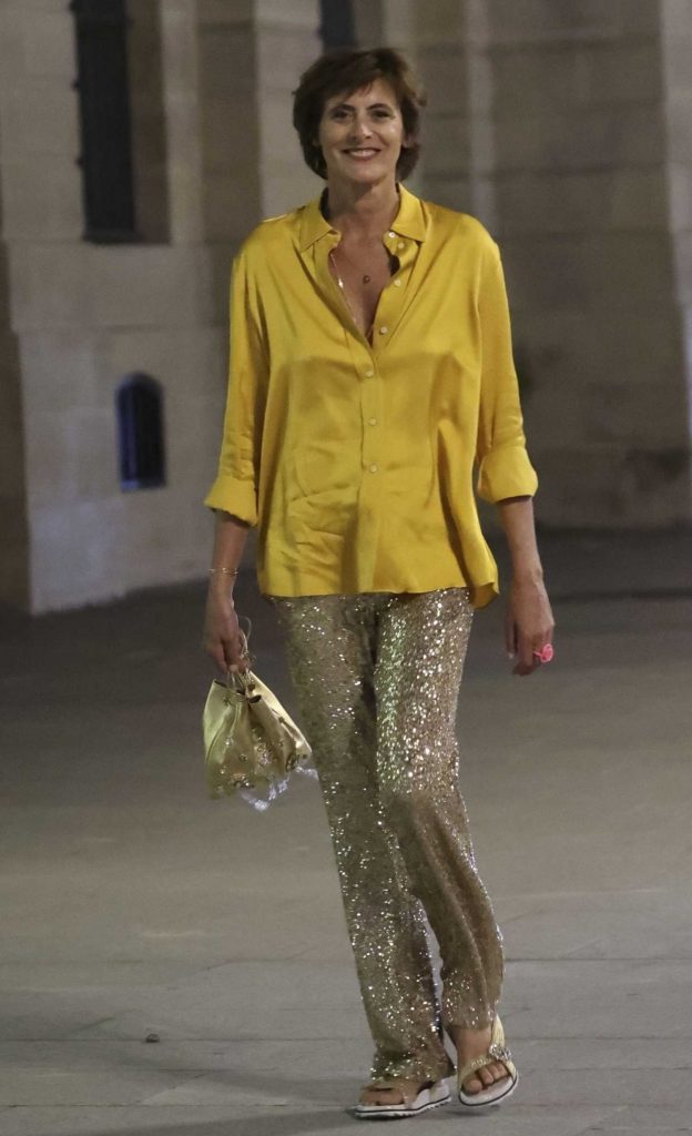 Ines de La Fressange in a Yellow Shirt