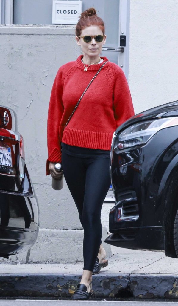 Kate Mara in a Red Sweater
