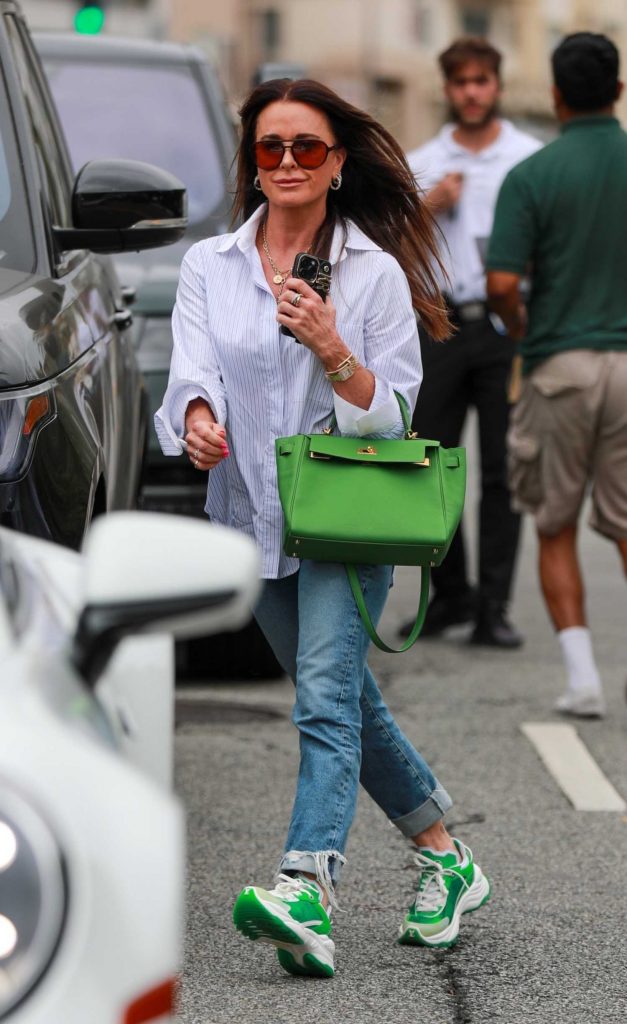 Kyle Richards in a Green Sneakers