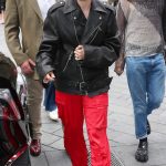 Millie Bobby Brown in a Red Pants Arrives at Capital Breakfast to Promote Her New Debut Novel Nineteen Steps in London