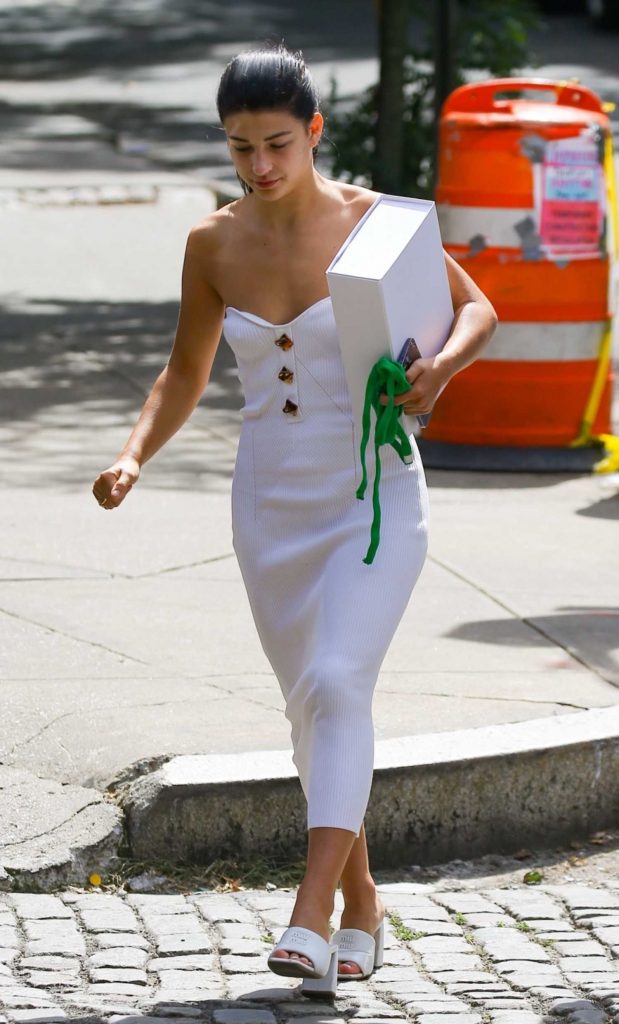 Phoebe Gates in a White Dress