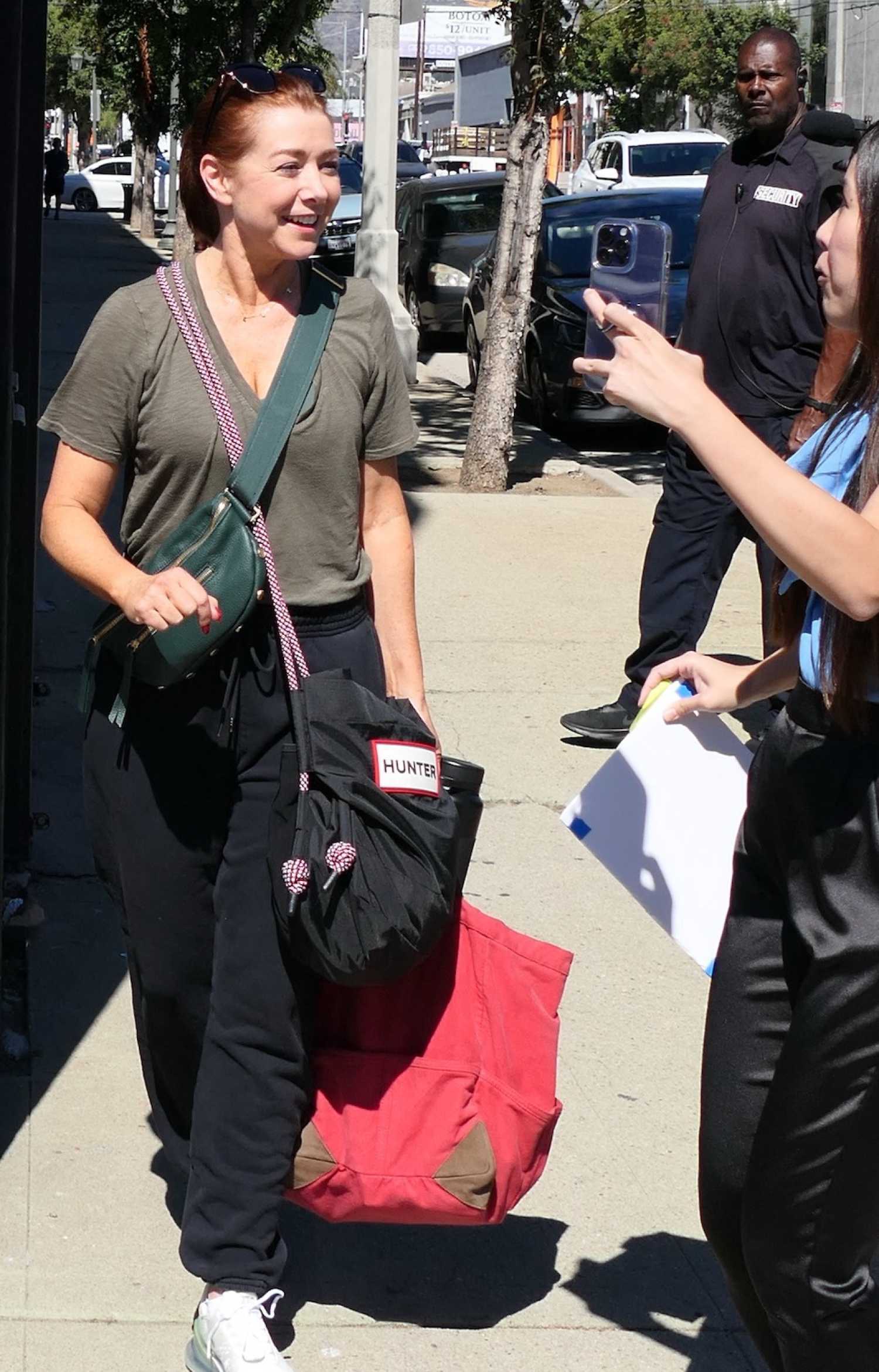 Alyson Hannigan in an Olive Tee Leaves the Dancing With the Stars