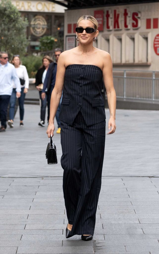 Ashley Roberts in a Black Striped Pantsuit