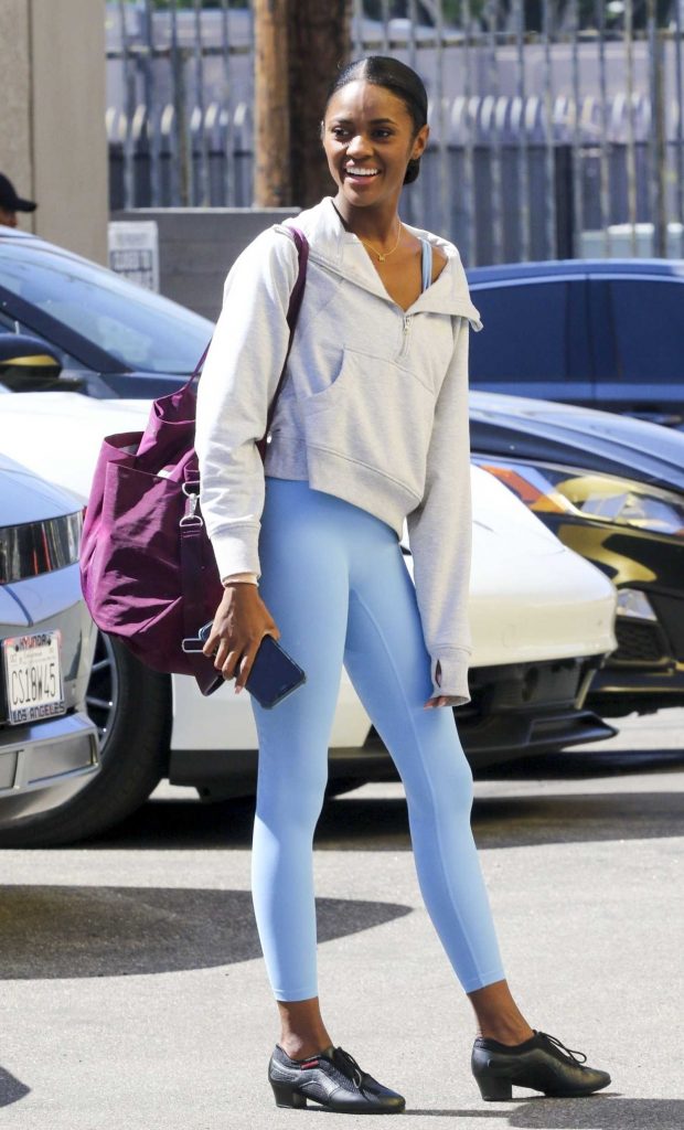 Charity Lawson in a Baby Blue Leggings