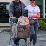 Denise Richards in a White Tee Was Seen During Evening Grocery Run with Husband Aaron Phypers at Erewhon in Calabasas
