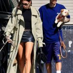 Hailey Bieber in an Olive Trench Coat Steps Out for Lunch with Her Dogs with Justin Bieber in Los Angeles