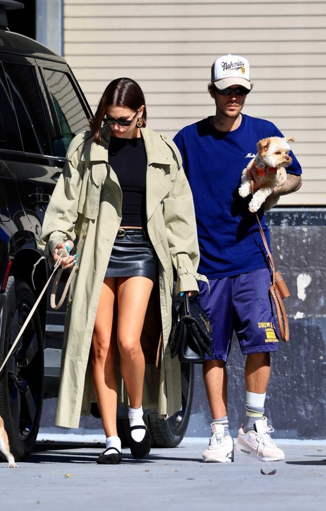 Hailey Bieber in an Olive Trench Coat