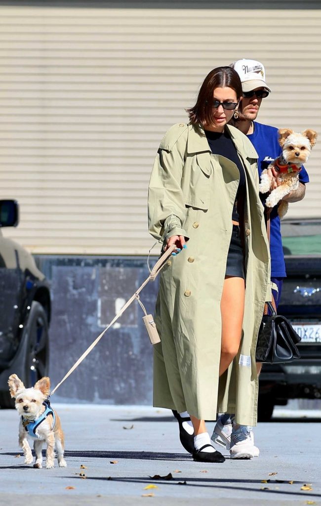 Hailey Bieber in an Olive Trench Coat