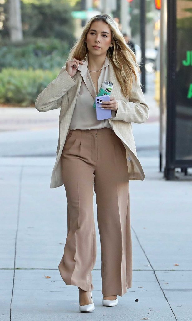 Haley Pullos in a Beige Blouse