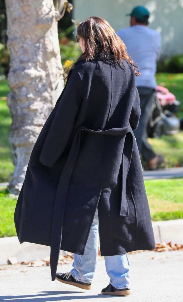 Miley Cyrus in a Black Coat