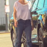 Milla Jovovich in a White Tee Was Seen at a Gas Station in Los Angeles
