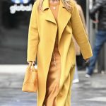 Amanda Holden in a Yellow Coat Leaves the Global Studios Heart Breakfast Show in London