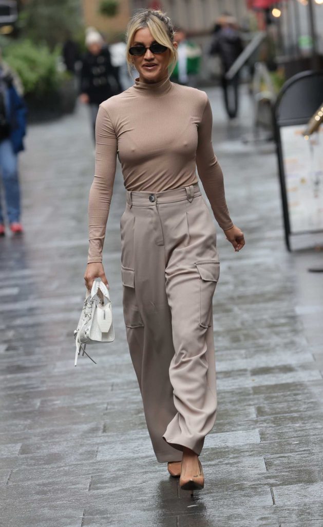 Ashley Roberts in a Beige Pants