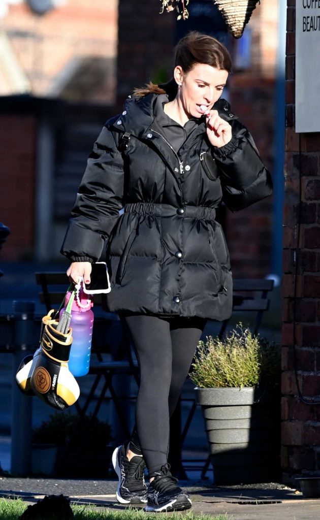 Coleen Rooney in a Black Puffer Jacket