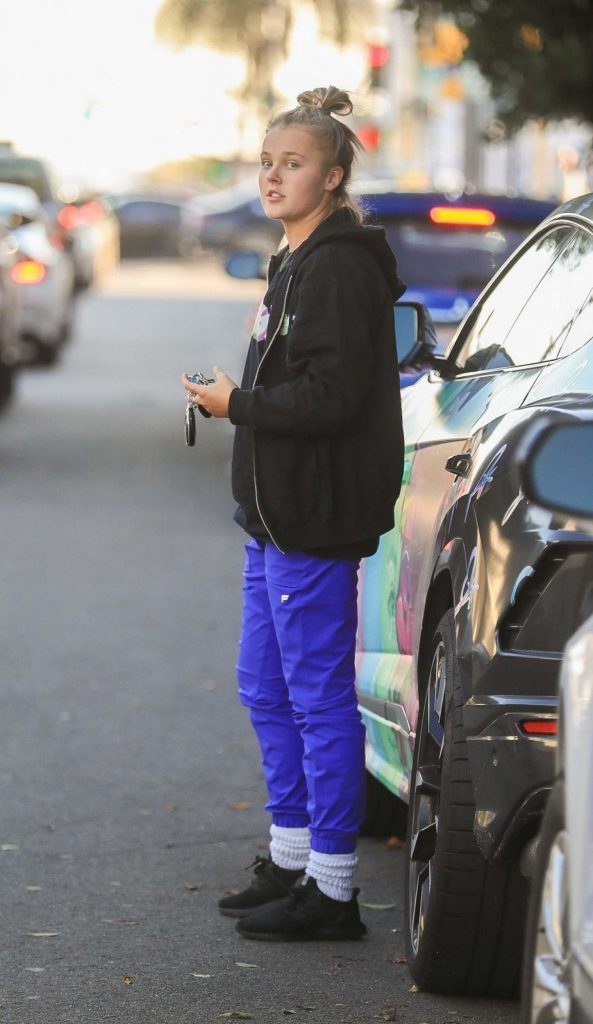 JoJo Siwa in a Blue Track Pants