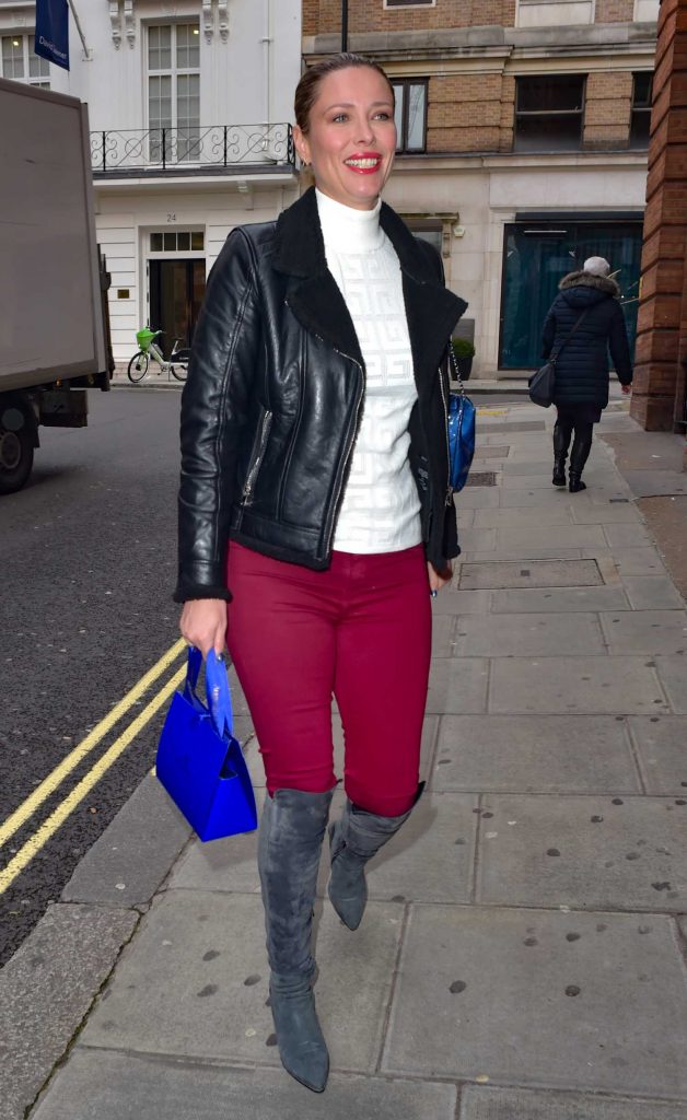 Kiera Chaplin in a Maroon Pants