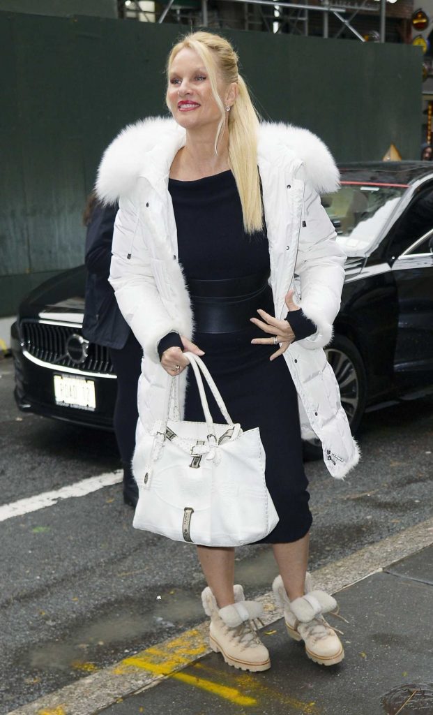 Nicollette Sheridan in a White Puffer Coat