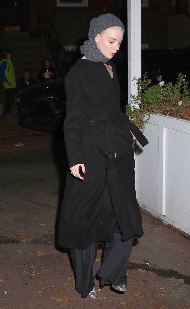 Anya Taylor-Joy in a Black Coat
