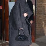 Dua Lipa in a Black Coat Leaves Her Hotel in New York
