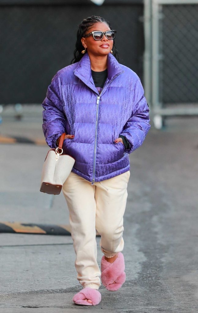 Halle Bailey in a Purple Puffer Jacket