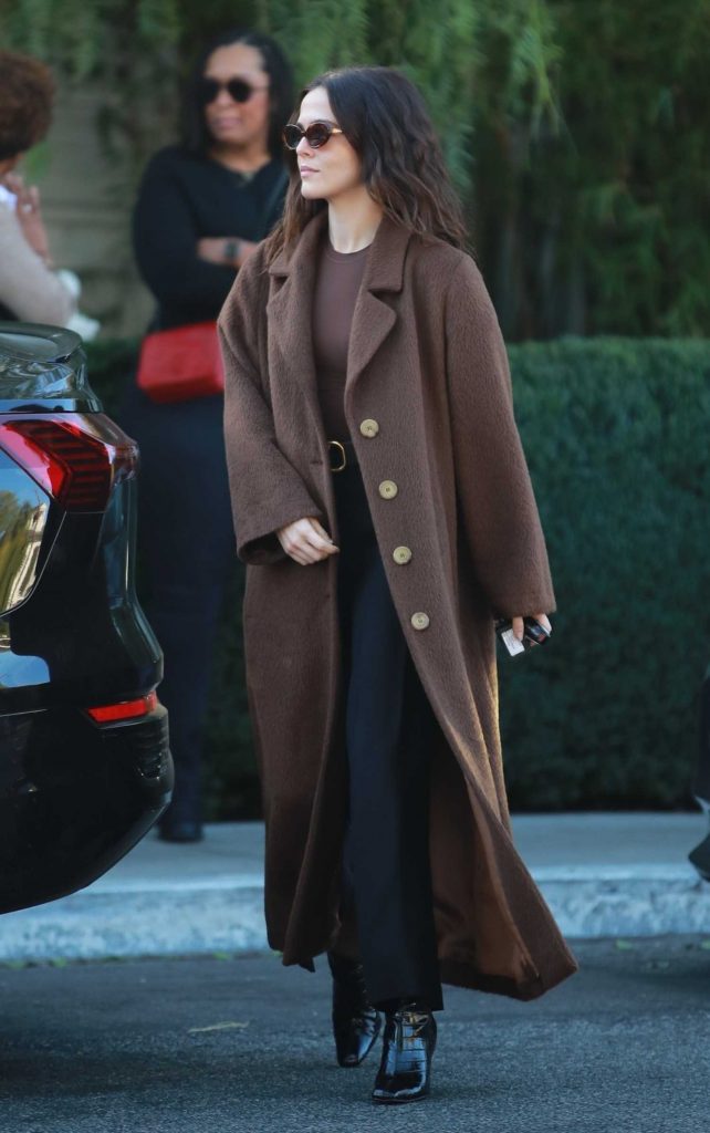 Zoey Deutch in a Brown Coat