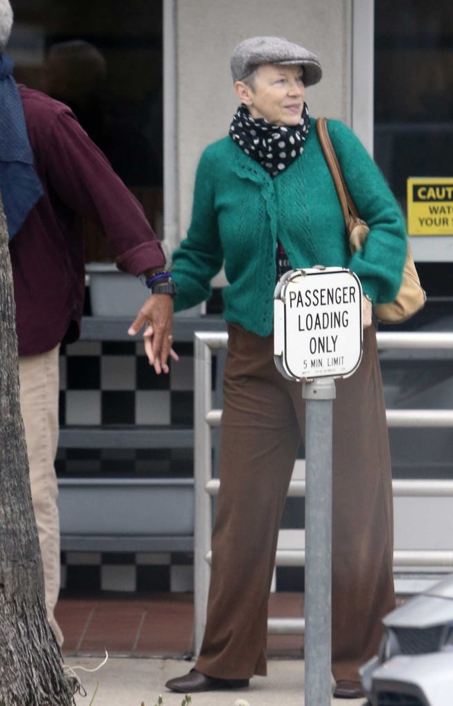 Annie Lennox in a Green Cardigan