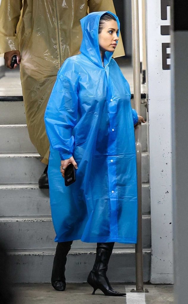 Bianca Censori in a Blue Stylish Raincoat