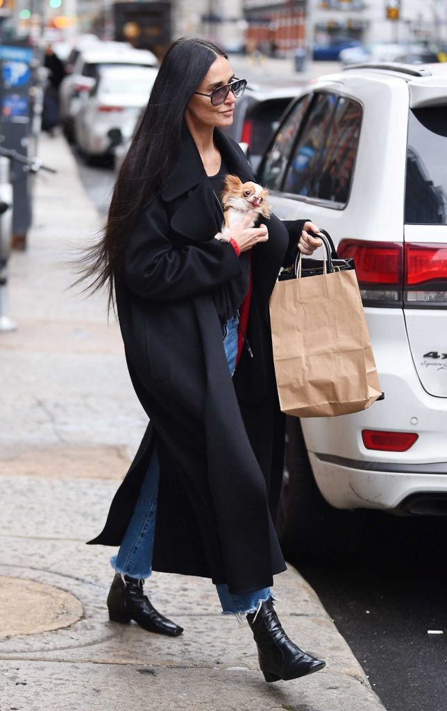 Demi Moore in a Black Coat