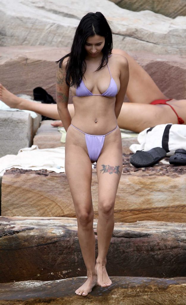 Evelyn Ellis in a Purple Bikini