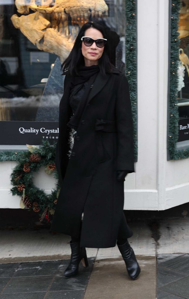 Lucy Lui in a Black Coat