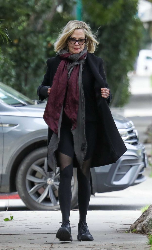 Melanie Griffith in a Black Coat