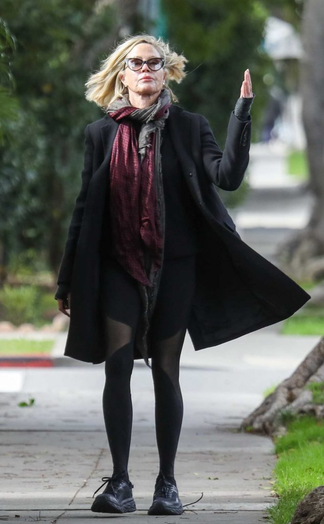 Melanie Griffith in a Black Coat