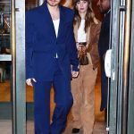 Ari Fournier in a Brown Leather Jacket Exits Her Hotel with Cole Sprouse in New York