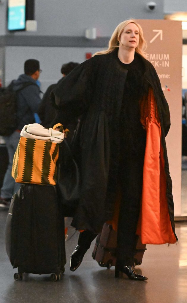 Gwendoline Christie in a Black Coat