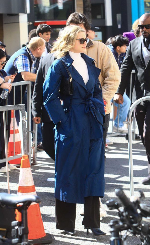 Lili Reinhart in a Blue Trench Coat