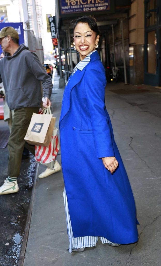 Liza Koshy in a Blue Coat
